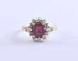 Emerald cut ruby and diamond ting set in 14k yellow gold