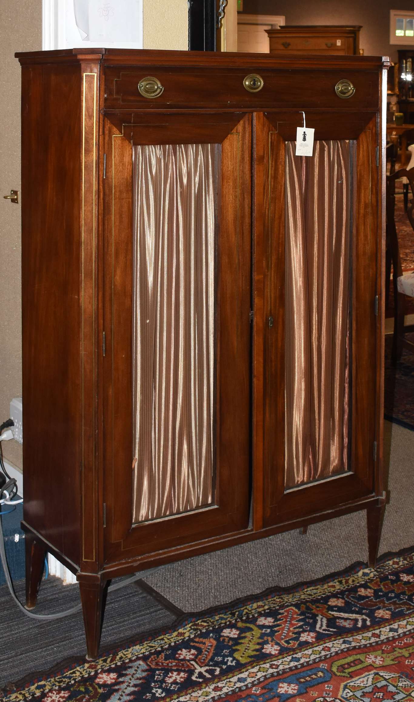 French 19th C. brass inlaid mahogany cabinet, with one drawer above two glass doors, 59”H. x 39”W. x 16”D.