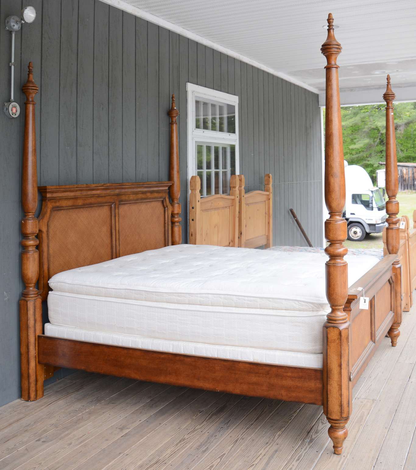King size four poster bed with faux rattan panels